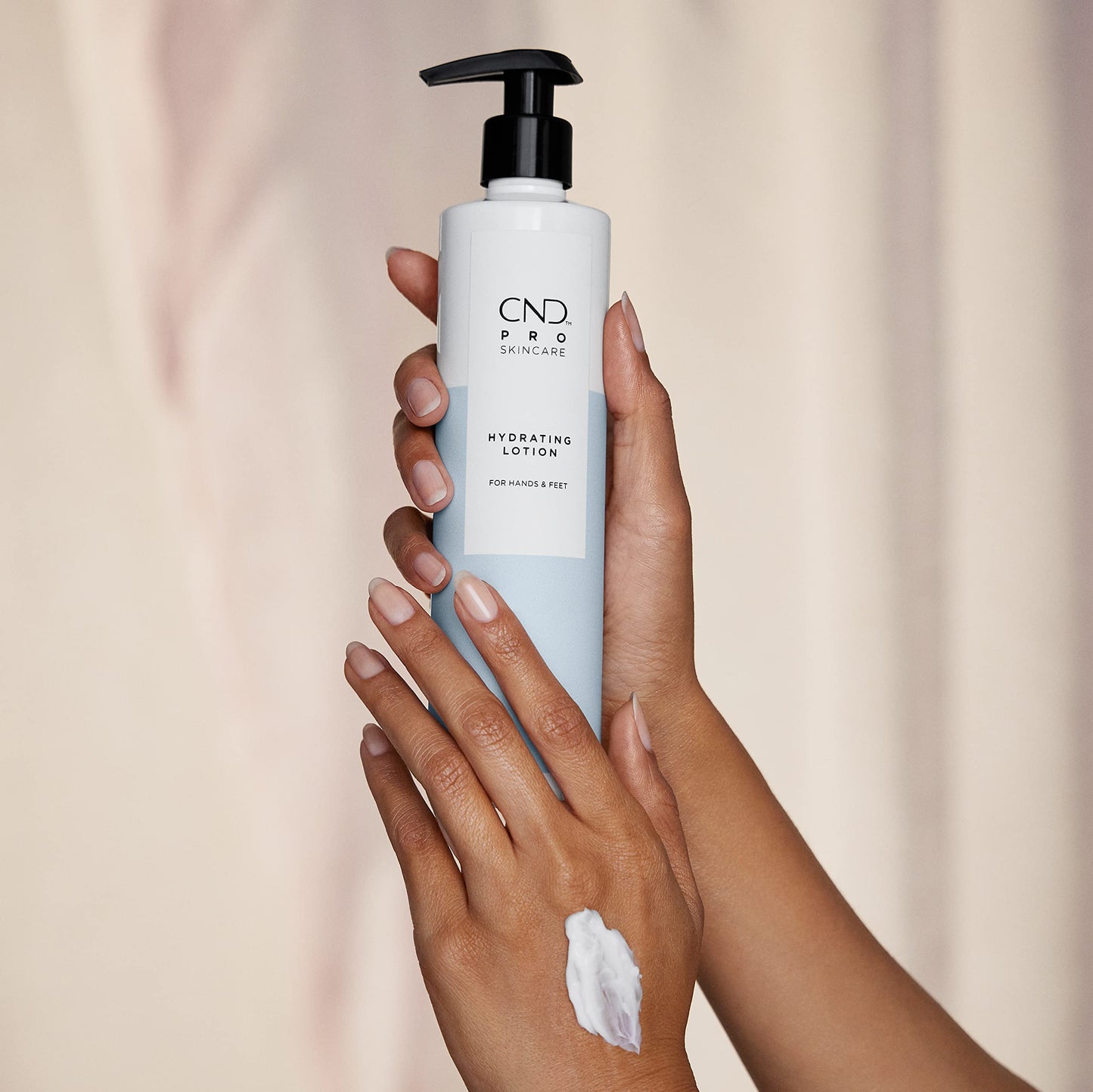 Light Gray CND Pro Skincare Hydrating Lotion, For Hands & Feet, 32 fl oz.