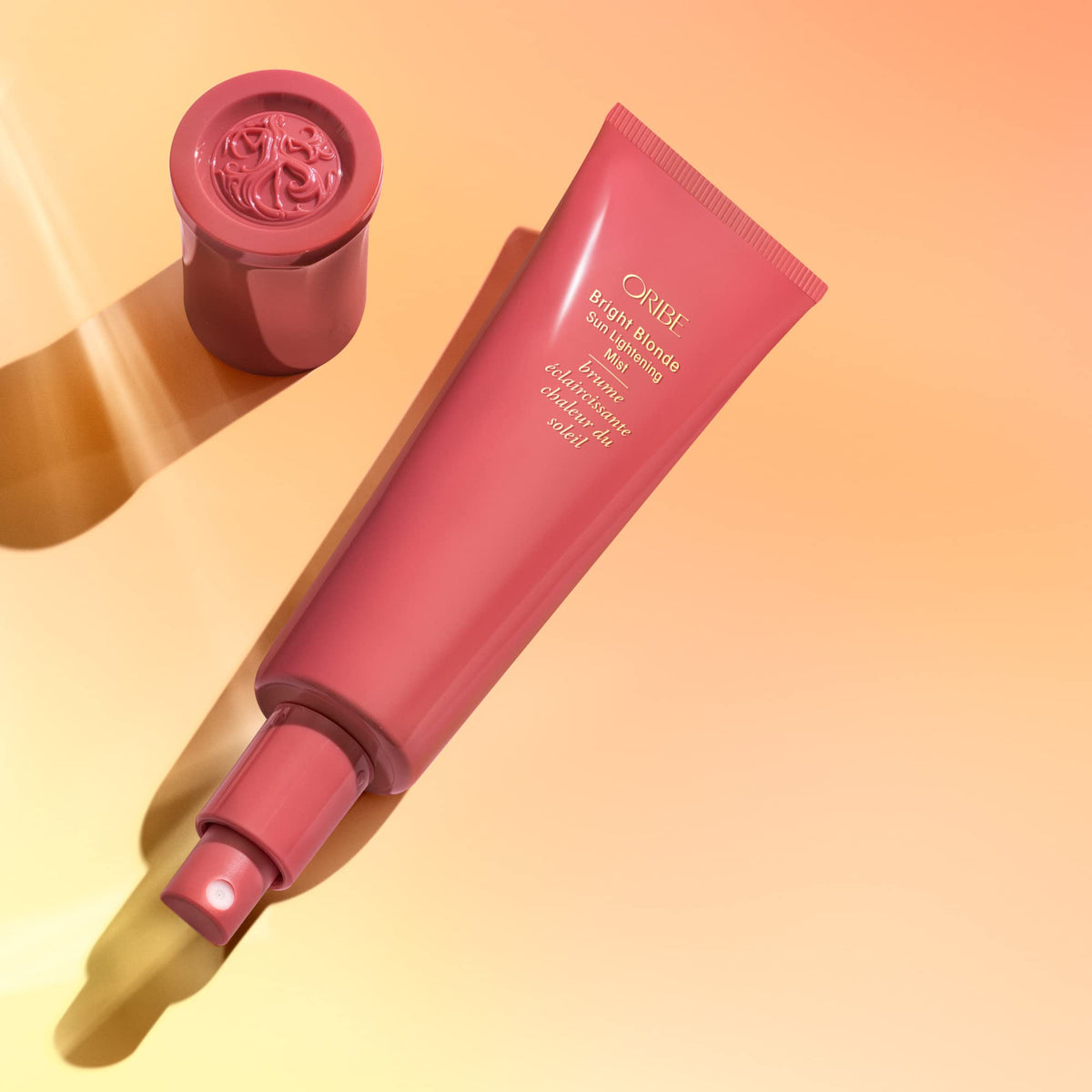 Light Salmon Oribe Bright Blonde Sun Lightening Mist - Enhances Blonde Hues - 3oz
