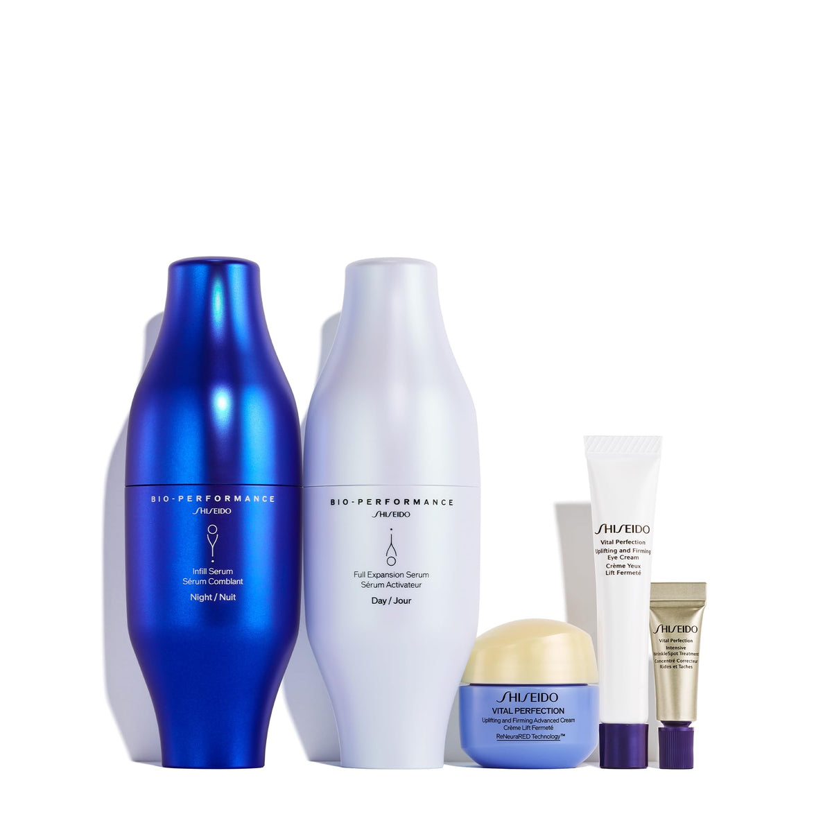 White Smoke Shiseido Day-to-Night Plumping Skincare Set - Bio-Performance Skin Filler Serums (30mL x2), Vital Perfection Advanced Cream (15mL), Eye Cream (5mL) & Intensive WrinkleSpot Treatment (2mL) - $375 Value