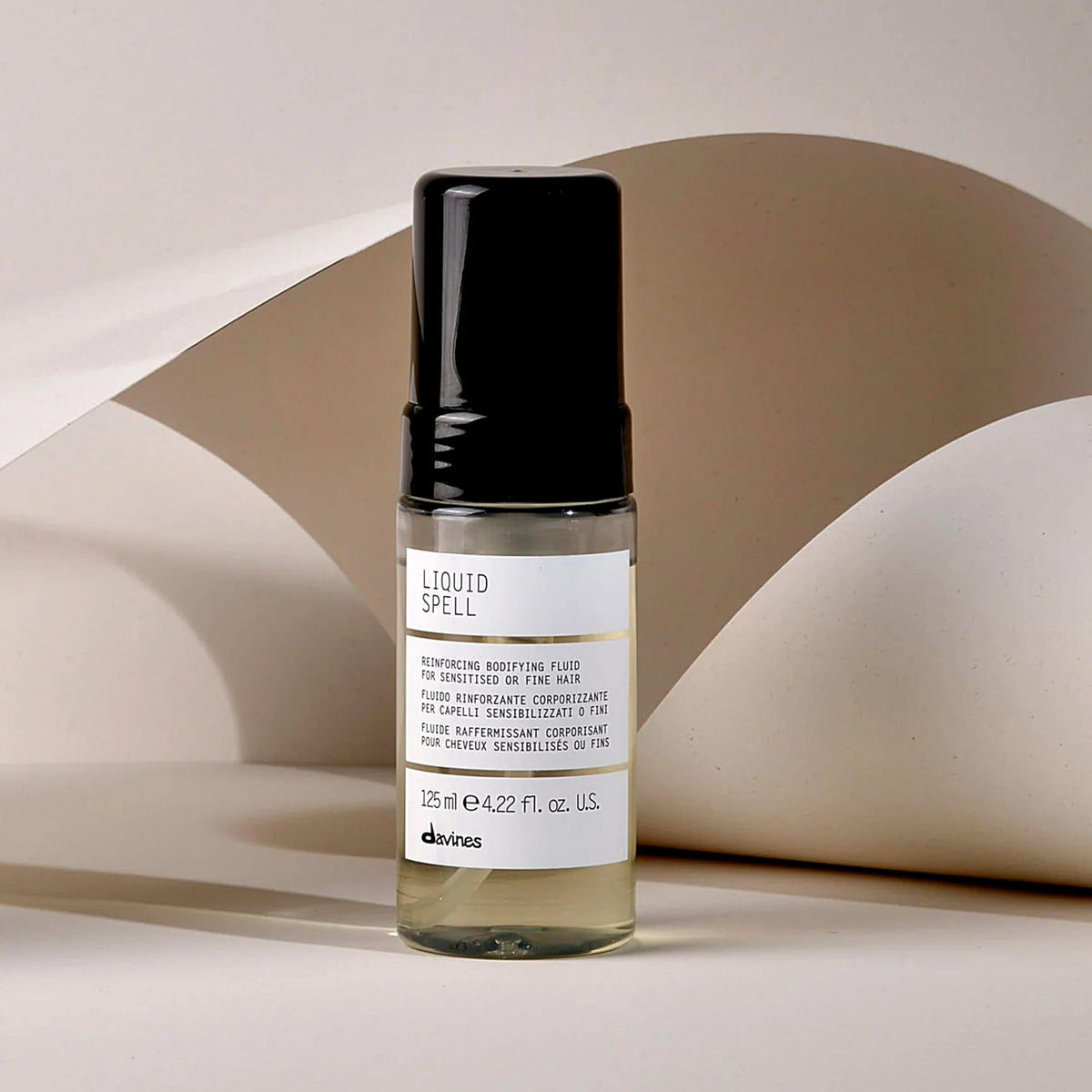 Light Gray Davines Liquid Spell Reinforcing Bodifying Fluid, Leave-In Fine Hair Mousse