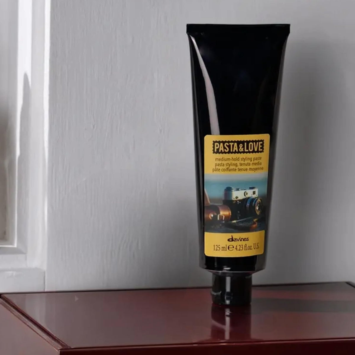 Dark Gray Davines Pasta & Love Medium hold workable styling paste, natural finish