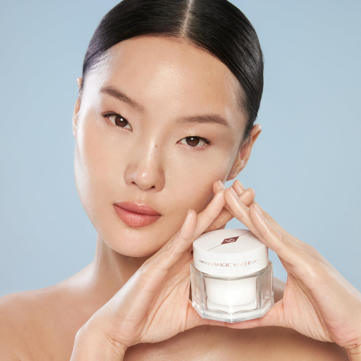 Light Steel Blue Charlotte Tilbury Magic Water Face Cream - Lightweight, Dewy Gel Moisturizer for Sensitive Skin - Infused with Niacinamide & Biopeptide Complex to Help Improve the Appearance of Fine Lines