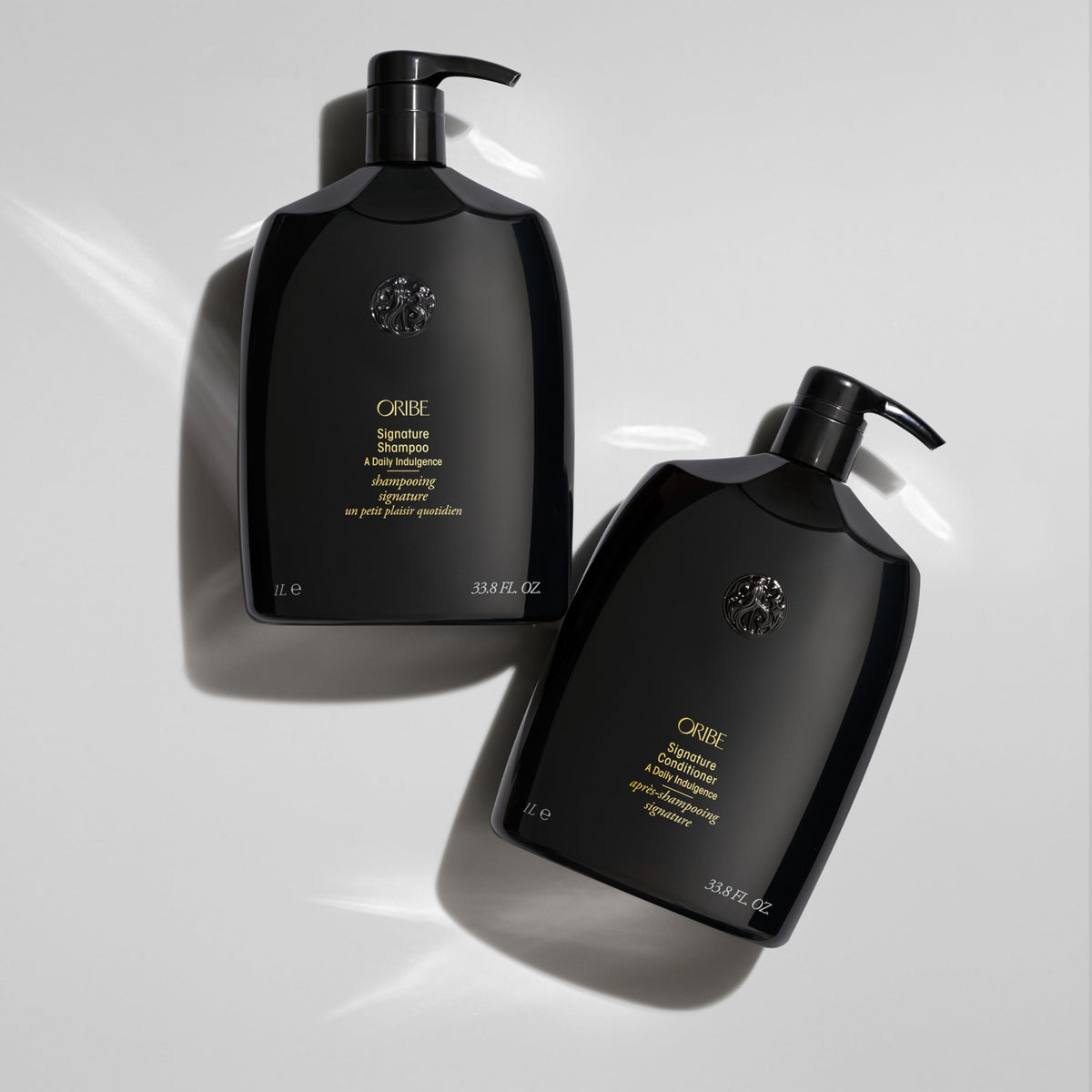 Light Gray Oribe Signature Shampoo - Hydrates & Protects Hair - Adds Shine