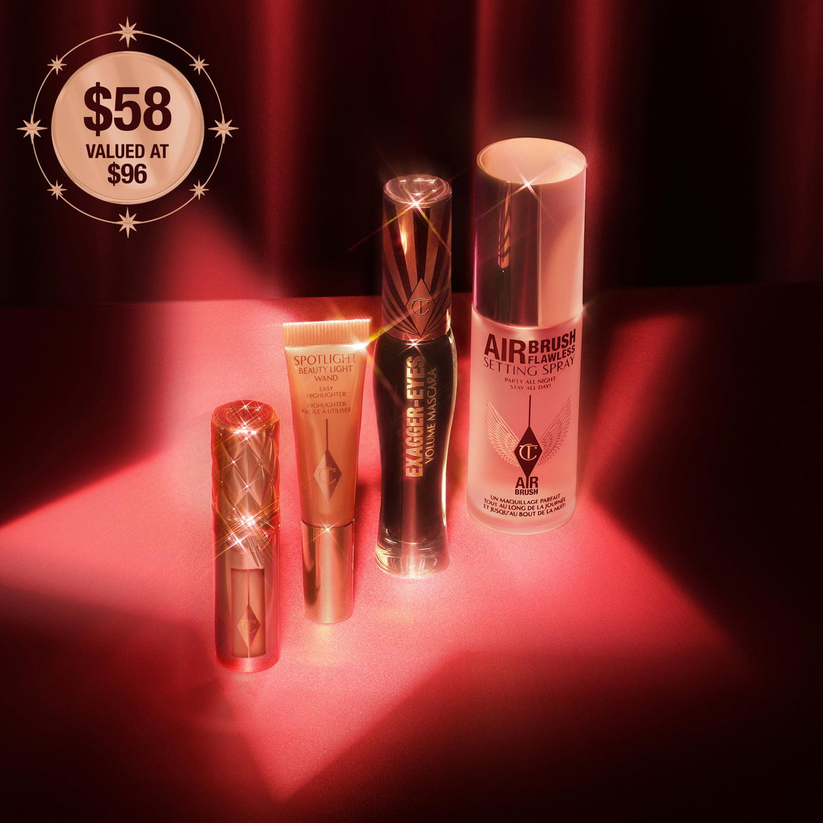 Black Charlotte Tilbury Iconic Hollywood Beauty Secrets, 4-Piece Makeup Gift Set with Mascara, Lip Plumper, Blush & Setting Spray