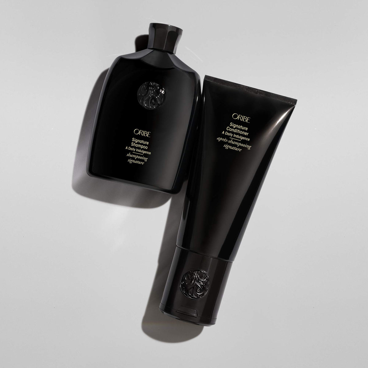 Light Gray Oribe Signature Shampoo - Hydrates & Protects Hair - Adds Shine