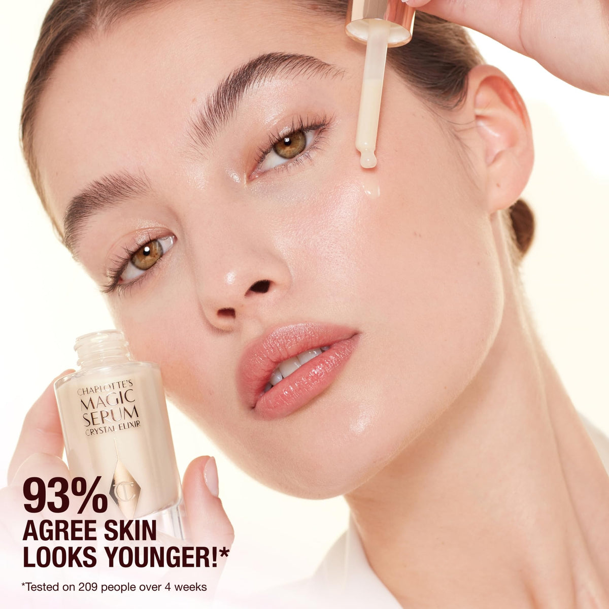 Light Pink Charlotte Tilbury Magic Serum Crystal Elixir - Firming Peptide Face Serum