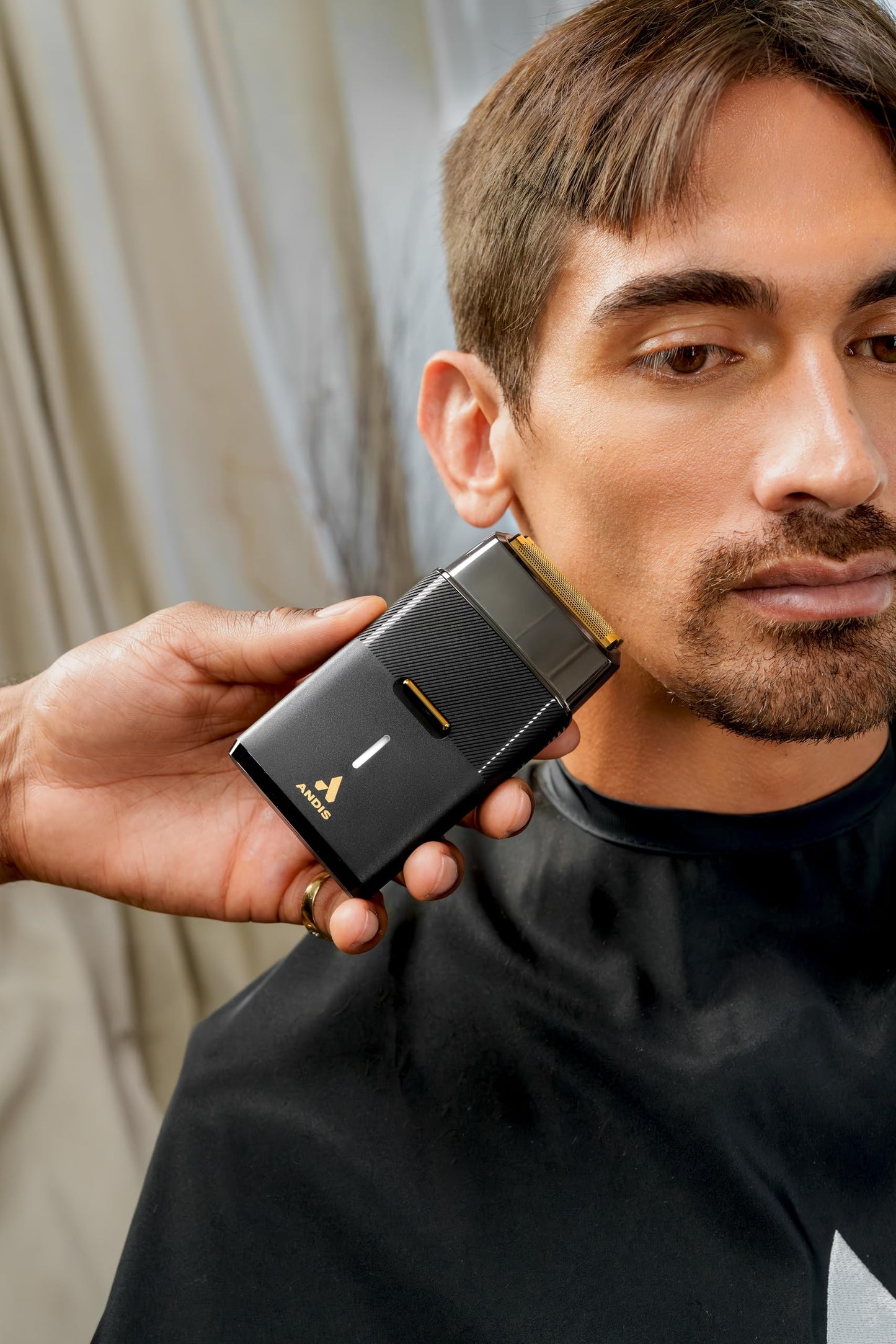 Black Andis 563616 Pro Foil Plus II Cordless Shaver, Gold Titanium Foils, Lithium Ion Battery, Includes USB-C Charging Stand, Black