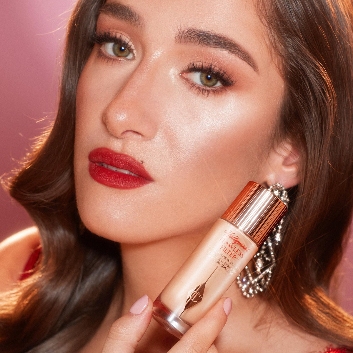 Dark Salmon Charlotte Tilbury Hollywood Flawless Filter - Multi‑Use Makeup Primer, Complexion Booster & Illuminating Liquid Highlighter with Sheer Coverage - Smooths & Blurs Skin